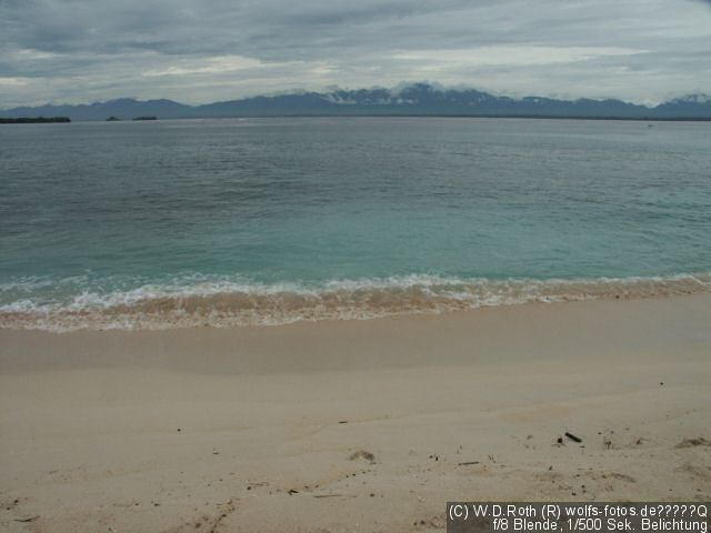 Strand, Meer und Berge auf einem Bild...